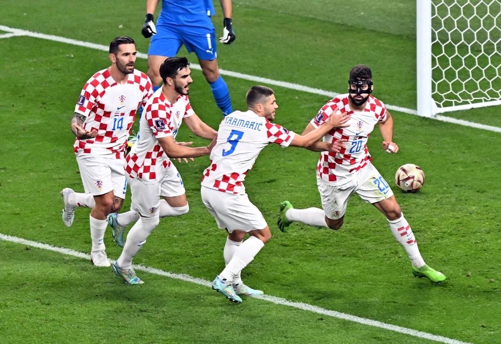 Pemain Croatia meraikan jaringan Gvardiol pada perlawanan penentuan tempat ketiga menentang Maghribi pada Sabtu.