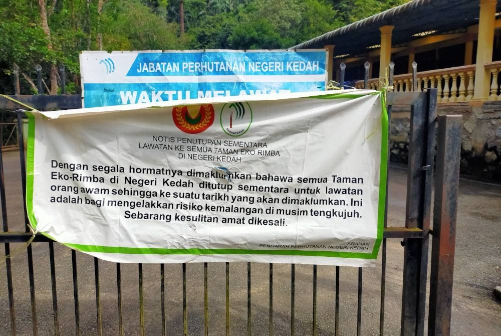 Notis penutupan sementara Taman Eko Rimba Bukit Wang di Kubang Pasu yang dikeluarkan oleh JPNK.