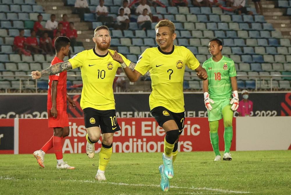 Faisal meraikan jaringan gol pertama Malaysia ketika perlawanan menentang Myanmar dalam aksi Kumpulan B Piala AFF di Stadium Thuwunna, baru-baru ini.