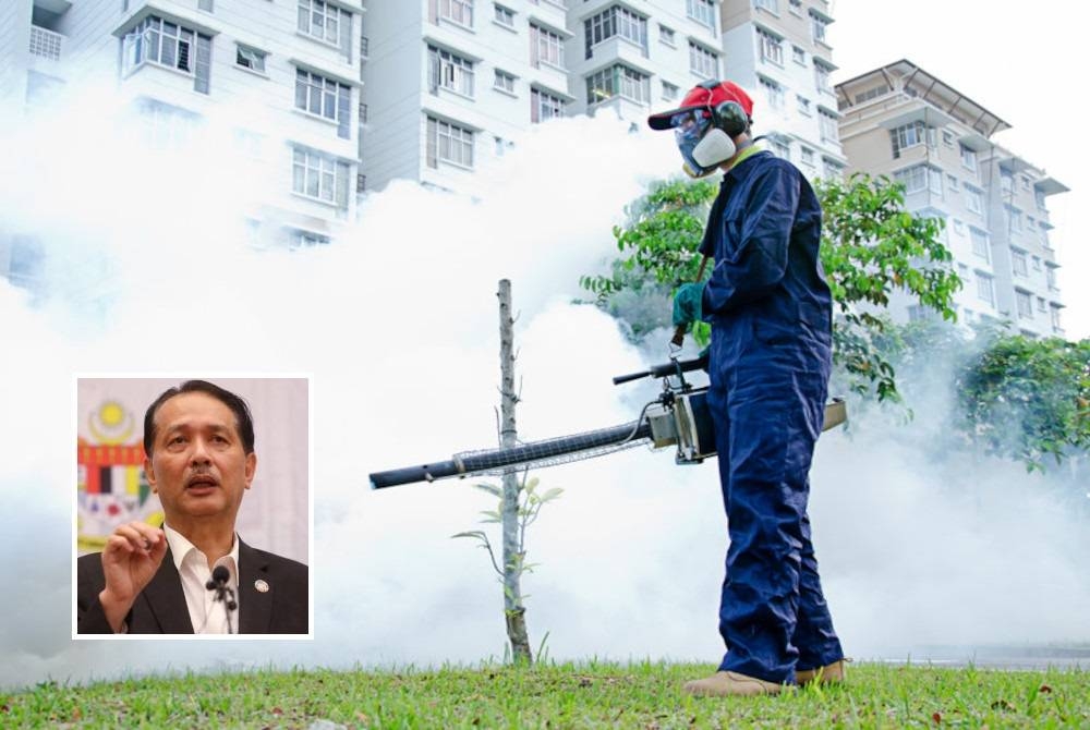 Dr Noor Hisham (gambar kecil) menyarankan orang ramai agar melakukan aktiviti gotong-royong bagi memutuskan kitaran hidup nyamuk Aedes . - Gambar hiasan 123RF