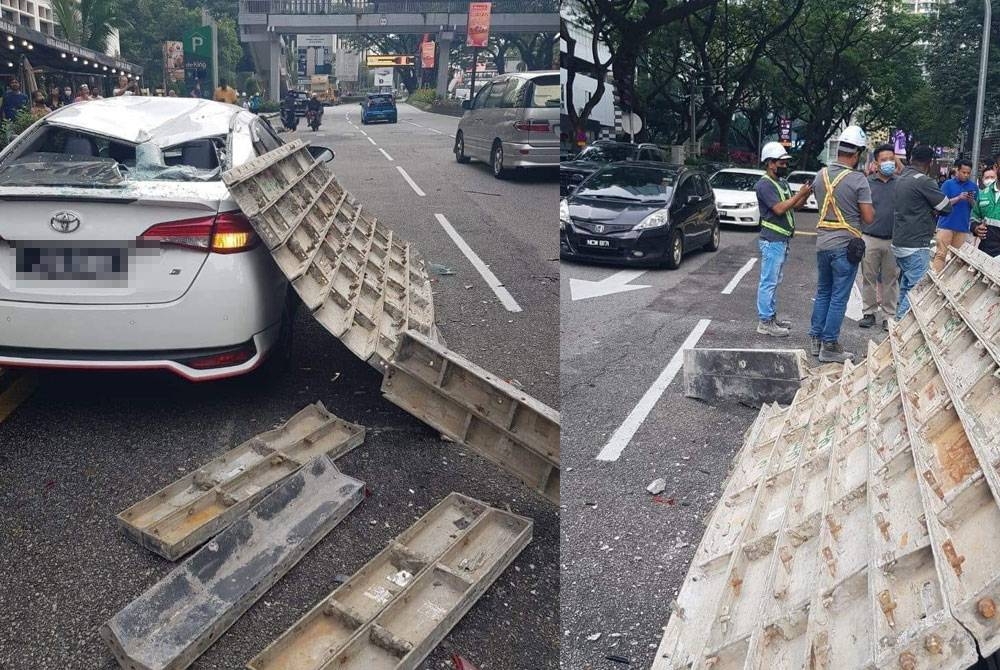 Sebuah kereta rosak teruk akibat dihempap objek yang terjatuh dari tingkat 56 sebuah menara yang dalam pembinaan.