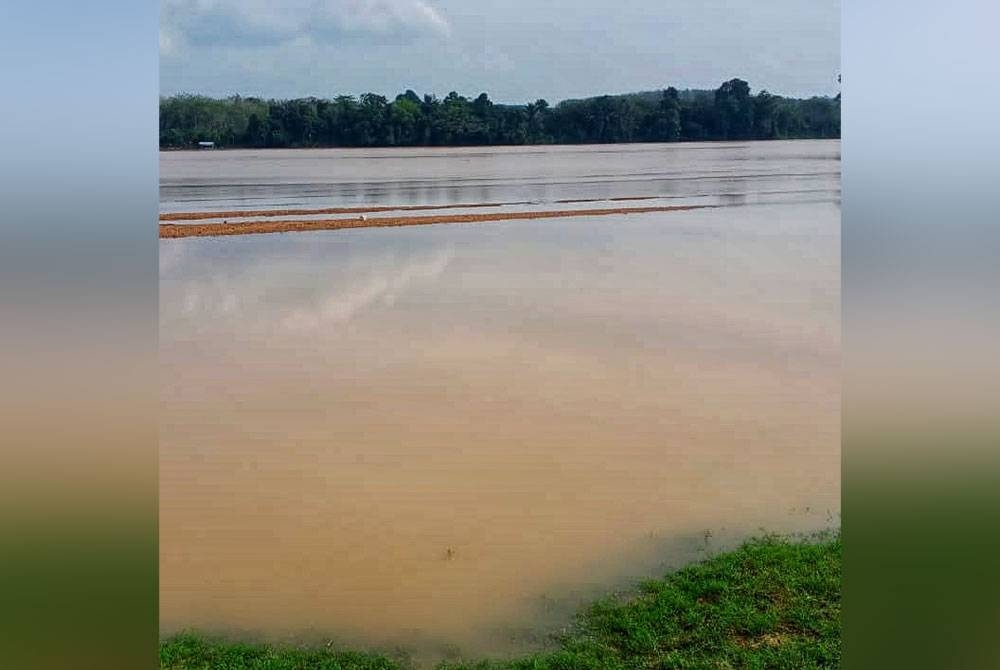 Lokasi kejadian di Sungai Pahang dekat Kampung Batu Nor, Bera menyaksikan seorang lelaki dikhuatiri lemas pada Sabtu. Foto: Ihsan JBPM