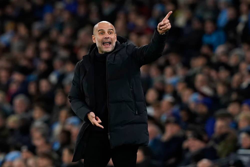 Guardiola memberi bayangan hayatnya di Etihad tidak bertahan lama. Foto EPA.