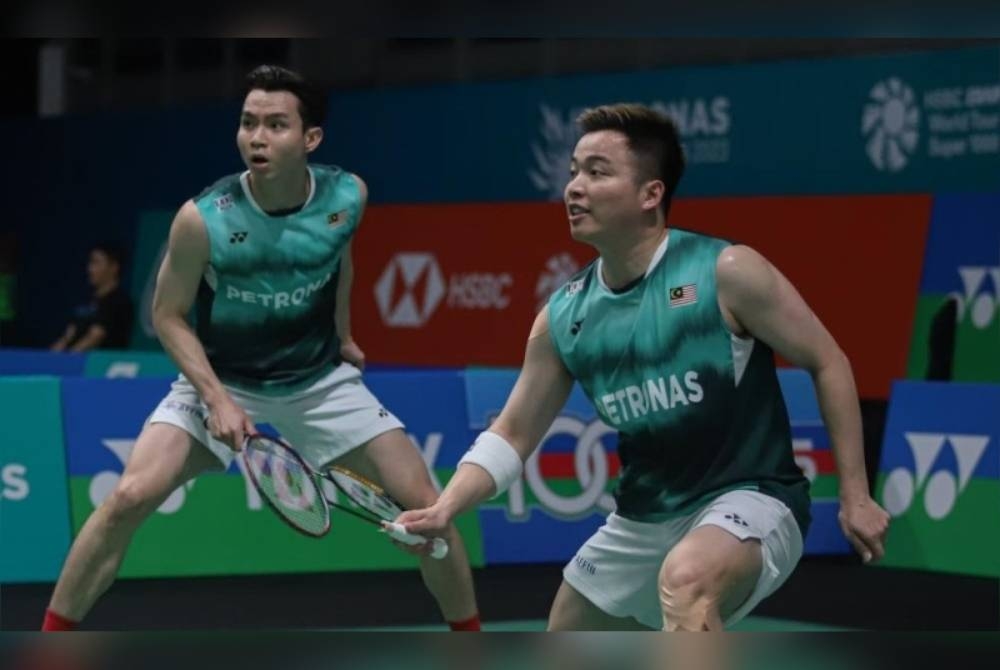 Aaron (kanan) dan Wooi Yik terpaksa berpuas hati dengan gelaran naib juara Terbuka India 2023.