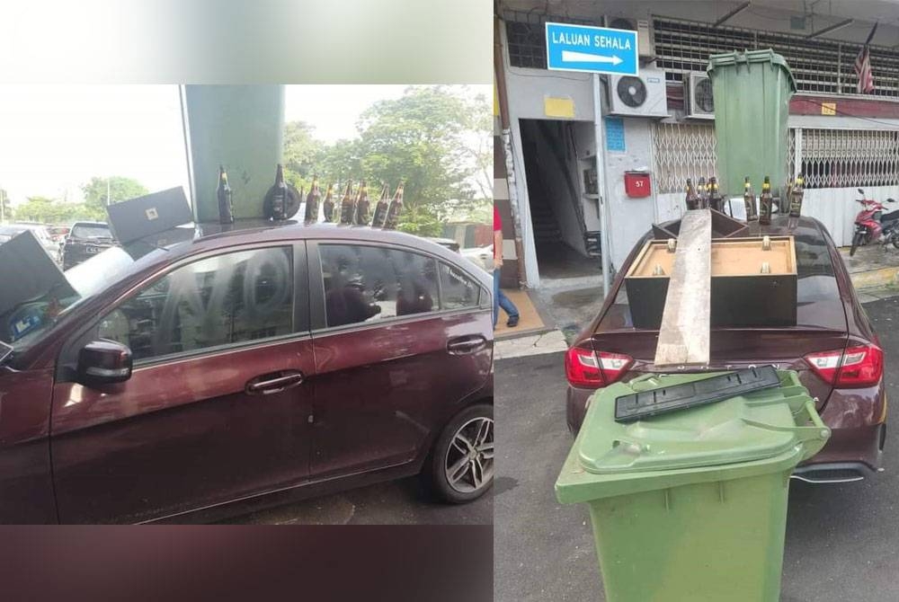 Cermin bahagian penumpang diconteng perkataan &#039;no parking&#039; menggunakan cat hitam. Tong sampah dan beberapa botol arak diletakkan di atas kereta mangsa. - Foto: PDRM