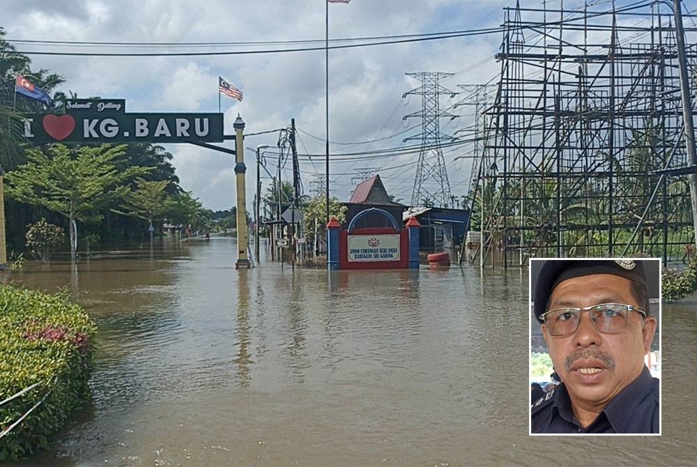 Keadaan laluan masuk Kampung Baru Parit Raja yang dinaiki air. Gambar kecil: Ismail