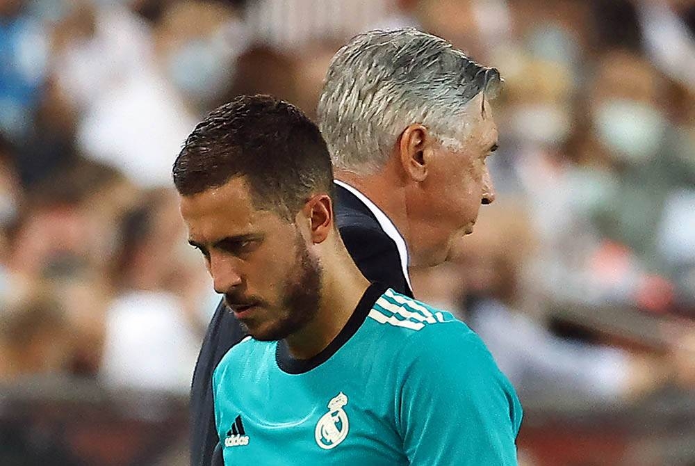 Hazard (kiri) merayu simpati Ancelotti peluang untuk turun beraksi bersama Real Madrid. - Foto Agensi