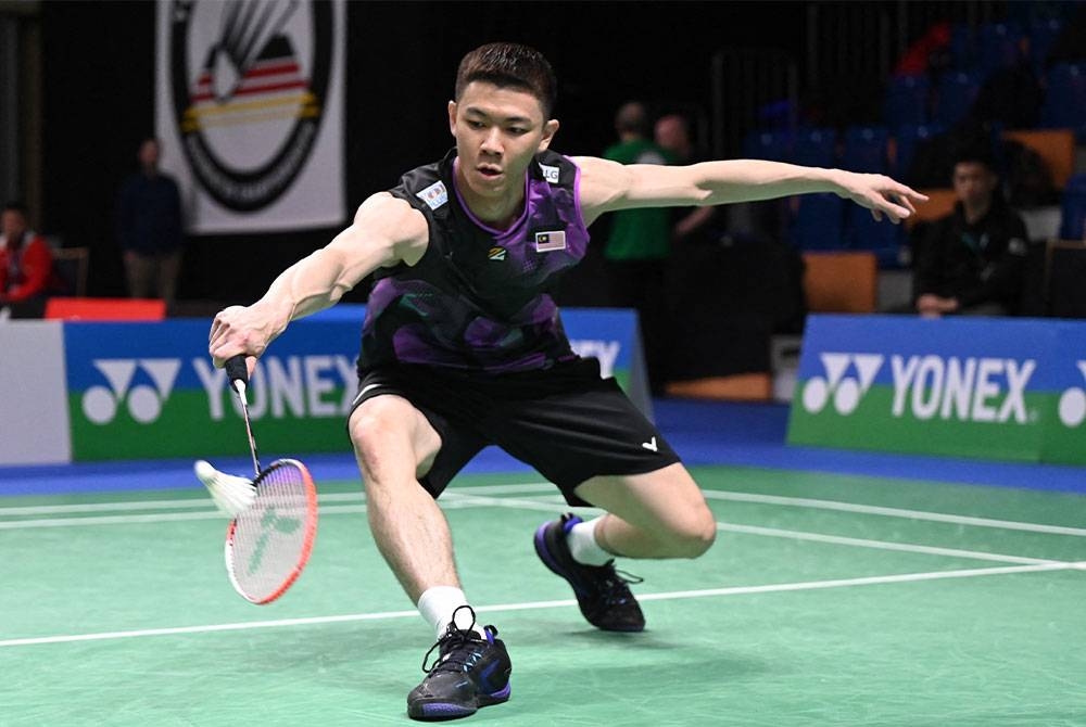 Zii Jia berjaya melangkah ke peringkat suku akhir kejuaraan All England 2023 selepas menewaskan Kenta Nishimoto dari Jepun. FOTO: AFP