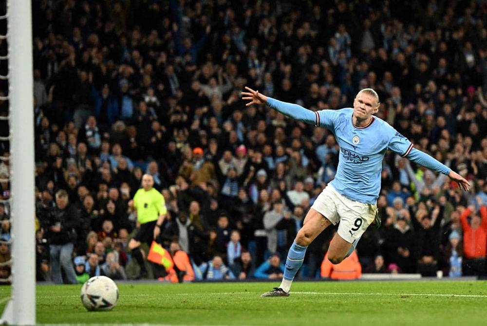 Haaland meledak hatrik ketika membantu City menewaskan Burnley 6-0 dalam saingan Piala FA awal pagi Ahad. - Foto AFP