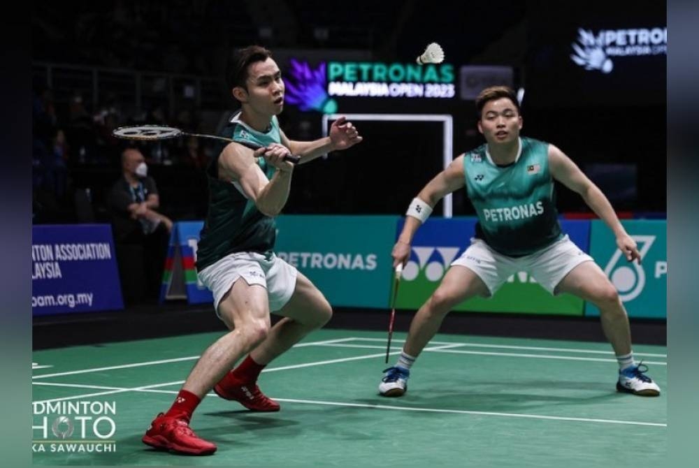 Aaron (kanan) dan Wooi Yik mahu fokus layak ke Olimpik terlebih dahulu sebelum memburu pingat buat negara. - Foto Badminton Photo