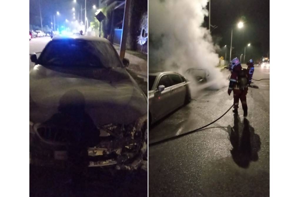 Empat buah kereta BMW terbakar di hadapan sebuah galeri kenderaan di Taman Eco Ara Damansara, Petaling Jaya, pada Isnin.