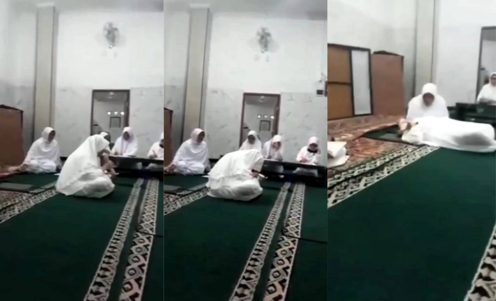 Rakaman video yang tular di media sosial memaparkan detik kematian seorang wanita yang sedang membaca al-Quran di sebuah masjid di Bandung. - Agensi