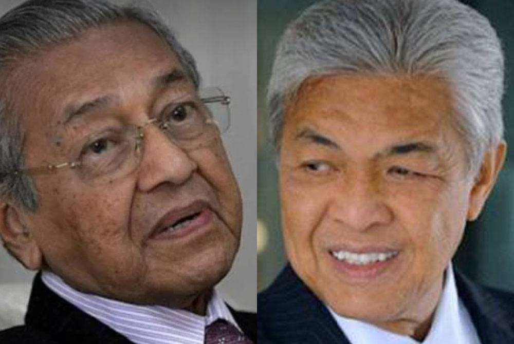 Tun Mahathir (kiri) dan Ahmad Zahid.