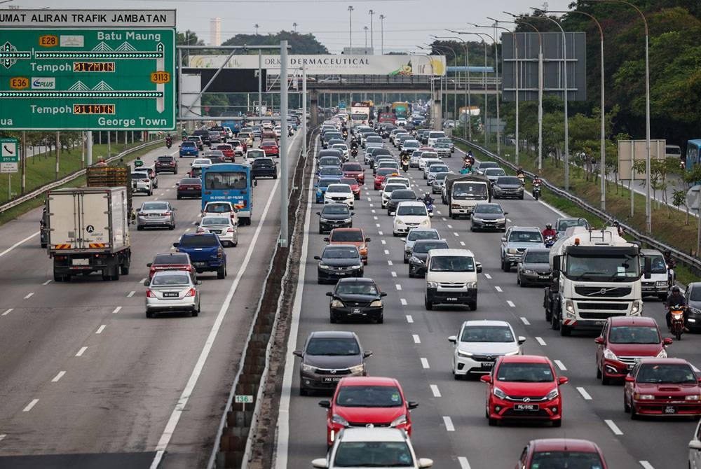 Aliran trafik di Lebuh Raya Utara Selatan arah ke arah utara, trafik bergerak perlahan dan semakin baik di beberapa kawasan seperti dari Slim River ke Sungkai, Tapah ke Gopeng dan dari Terowong Menora ke Kuala Kangsar. - Foto: Bernama