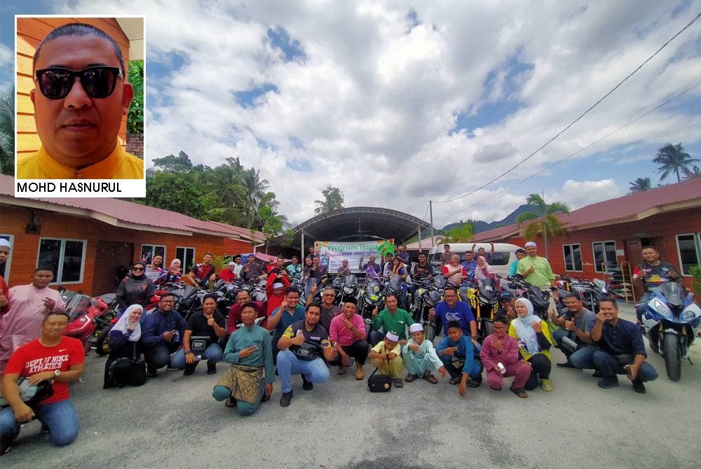 (MAIN PIX) Ahli Kelab Bunian Bikerz bersama warga Pertubuhan Badan Kebajikan Anak-Anak Yatim Darussalam merakam kenangan sempena Program Raya Bersama Anak-Anak Yatim di Pertubuhan Badan Kebajikan Anak-Anak Yatim Darussalam di sini pada Isnin.