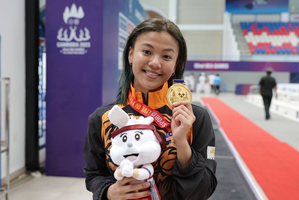 Kimberly meraih 276.3 mata keseluruhan sekali gus mengekalkan pingat emas yang dimenangi Ng Yan Yee untuk acara sama pada edisi 2021 di Vietnam.- Foto Bernama