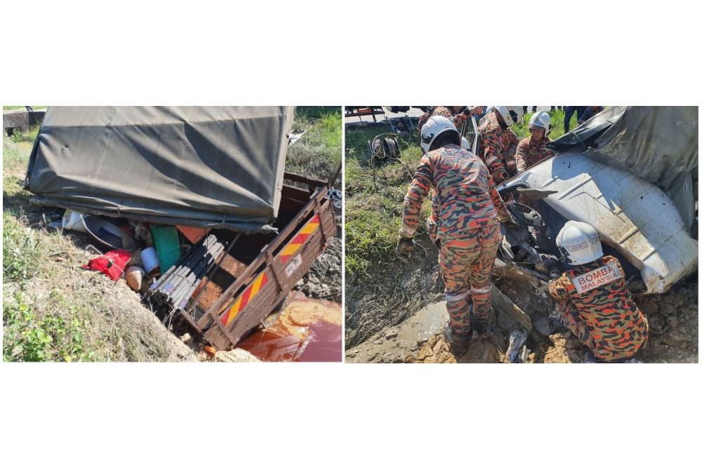 Anggota bomba guna peralatan khas keluarkan seorang wanita yang tersepit selepas lori dinaiki terbabas dan masuk ke dalam parit di Jalan Kayu Ara Pasong, Pontian pada Isnin.