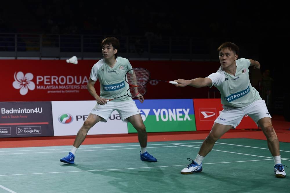 Wei Chong dan Kai Wun beraksi baik sebelum tumbang dalam aksi final Masters Malaysia 2023 di Axiata Arena sebentar tadi. -Foto: Bernama