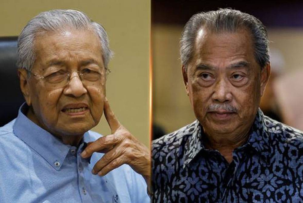 Tun Mahathir (kiri) dan Muhyiddin (kanan).