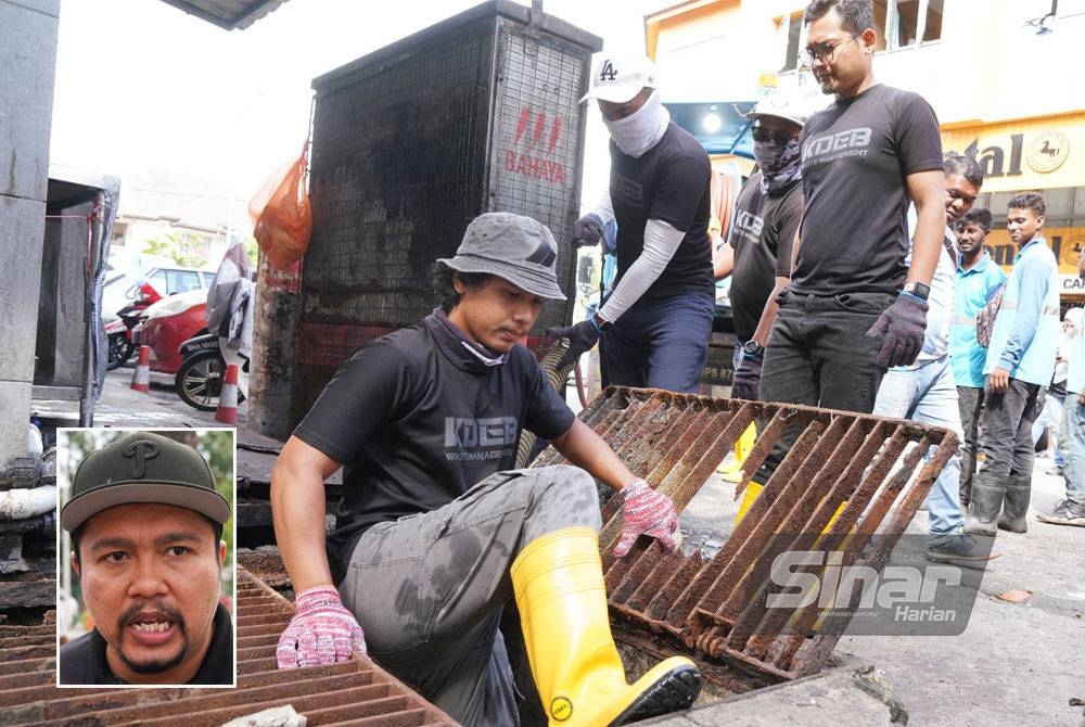 Pekerja KDEBWM menjalankan kerja pembersihan pada Operasi Meruntuhkan Stuktur Binaan Atas Longkang di Jalan USJ 1/19 dan USJ 1/20 Taman Subang Permai pada Rabu. - FOTO: ROSLI TALIB. Gambar kecil: Mohd Fauzan.