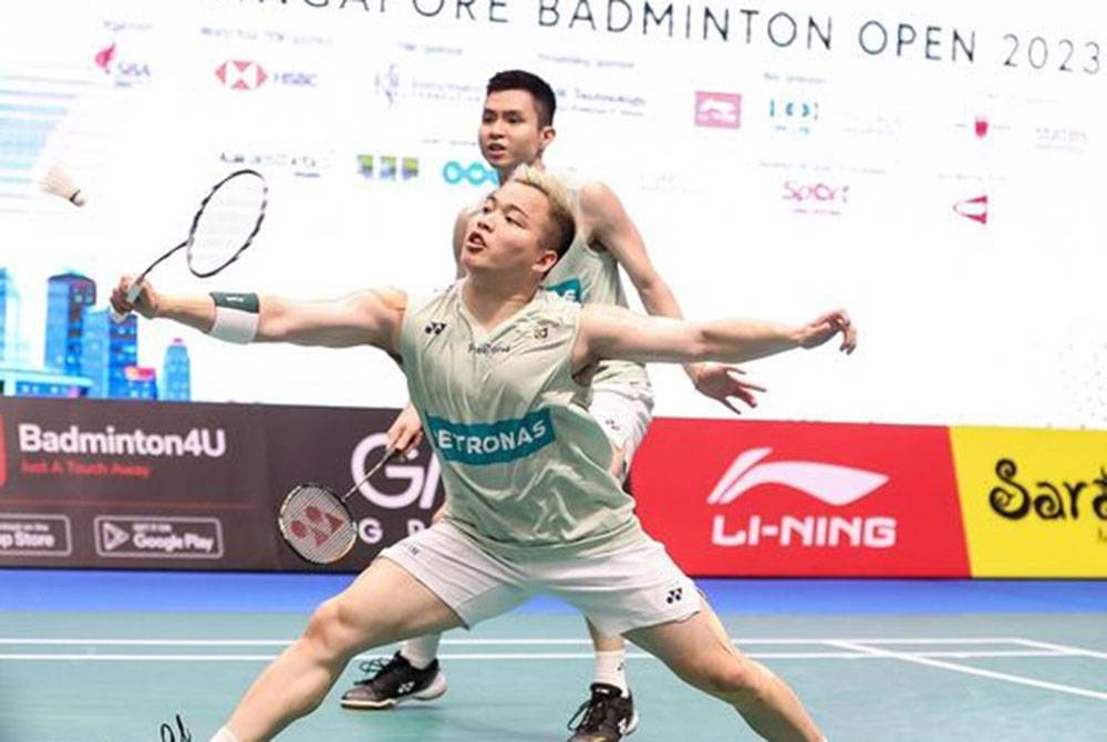 Aaron-Wooi Yik mengambil masa 38 minit untuk mencatat kemenangan straight set 21-18, 21-17 ke atas wakil Indonesia. - Foto Badminton Association of Malaysia