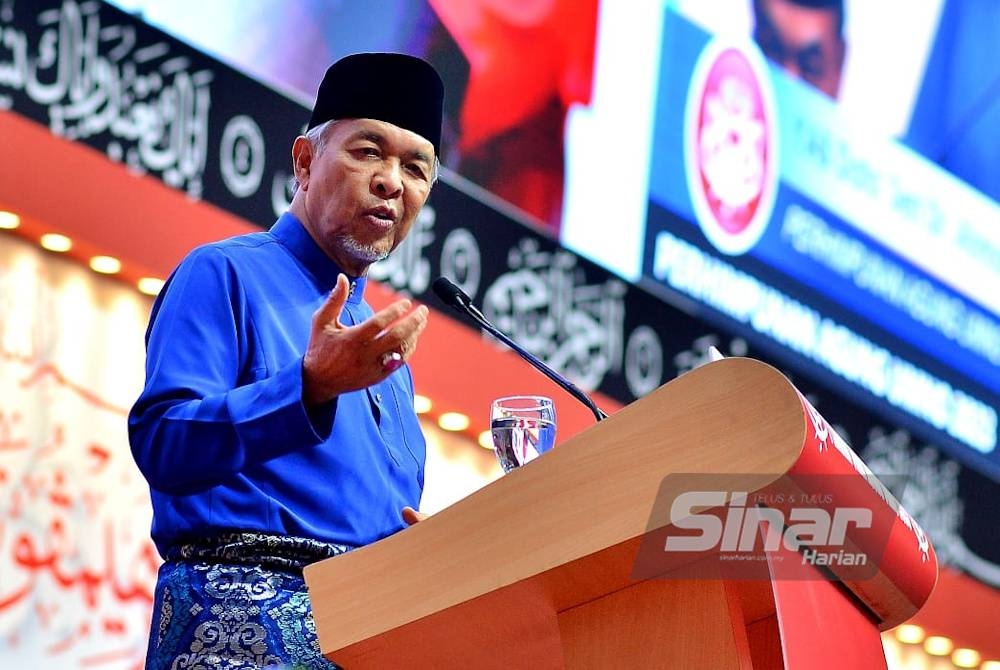 Ahmad Zahid membuat ucapan penggulungan pada hari terakhir Perhimpunan Agung UMNO 2023 di Pusat Dagangan Dunia Kuala Lumpur pada Sabtu. - Foto Sinar Harian ASRIL ASWANDI SHUKOR