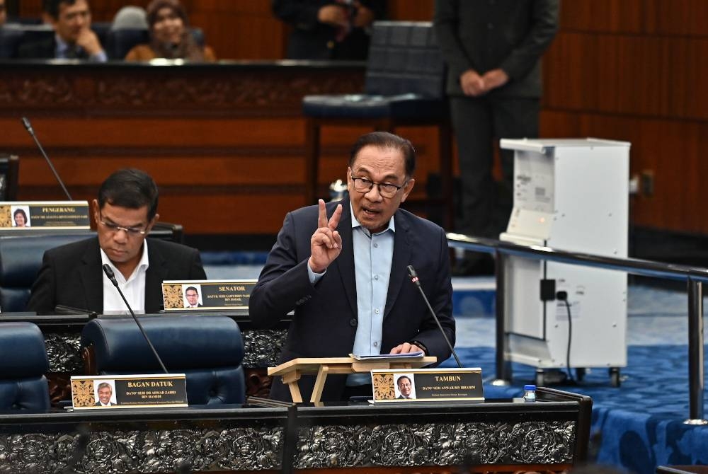 Anwar ketika berucap dalam sesi Waktu Pertanyaan-Pertanyaan Menteri (MQT) dalam persidangan Dewan Rakyat pada Selasa. - Foto Jabatan Penerangan Malaysia