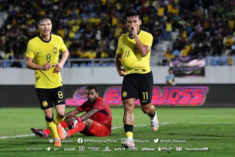 Pawi meraikan jaringan gol ketiga Harimau Malaya ketika berdepan Kepulauan Solomon dalam aksi persahabatan di Stadium Sultan Mizan Zainal Abidin, Terengganu pada Rabu. - Foto Facebook FAM