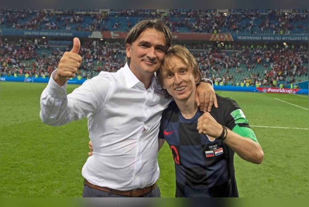 Dalic (kiri) berharap Modric kekal untuk tempoh lebih lama bersama Croatia. - Foto Agensi