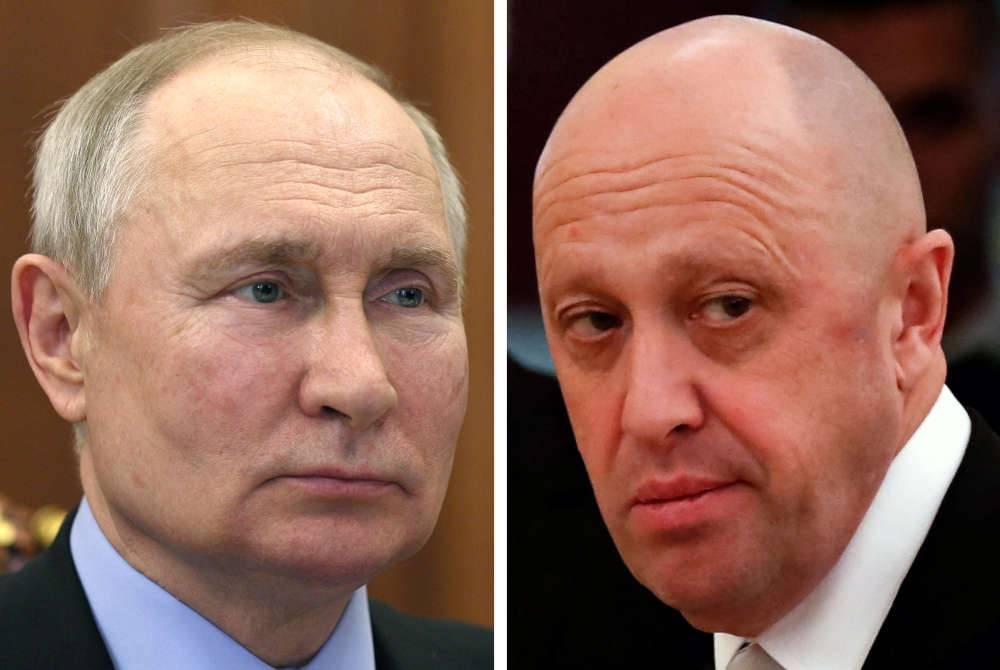 Presiden Rusia Vladimir Putin (kiri) dan ketua tentera upahan Wagner, Yevgeny Prigozhin. - AFP