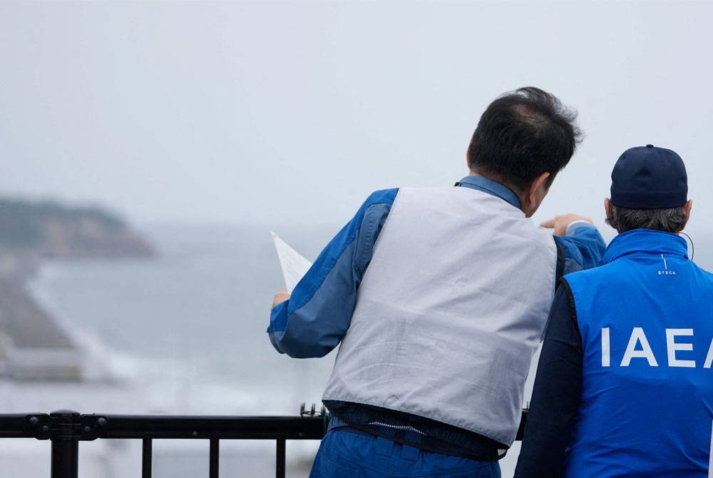 Grossi berkata bahawa pelepasan air terawat yang disimpan di Fukushima Daiichi Power Station adalah keputusan nasional oleh kerajaan Jepun dan laporan itu bukanlah satu cadangan atau menyokong dasar tersebut. - Foto POOL / AFP