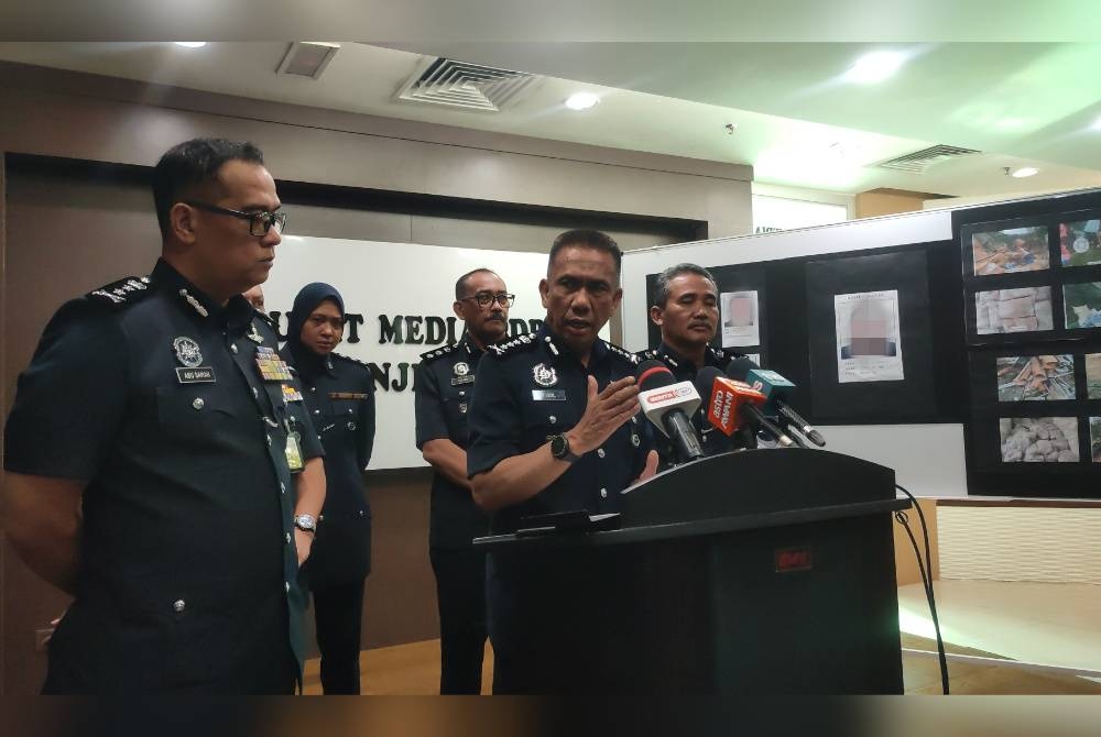 Fisol (tengah) pada sidang media di Ibu Pejabat Polis Kontinjen (IPK) Kedah pada Khamis.