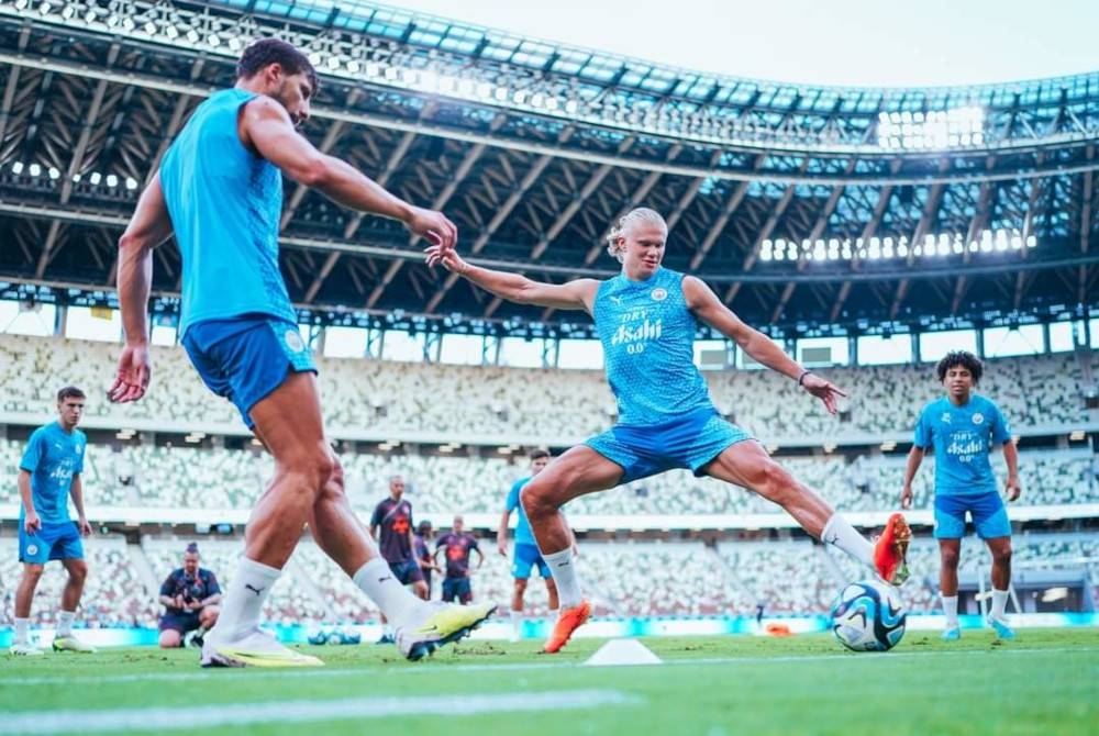 Angkatan Guardiola giat menjalani latihan menjelang perlawanan persahabatan pramusim City di Tokyo .- Foto AGENSI