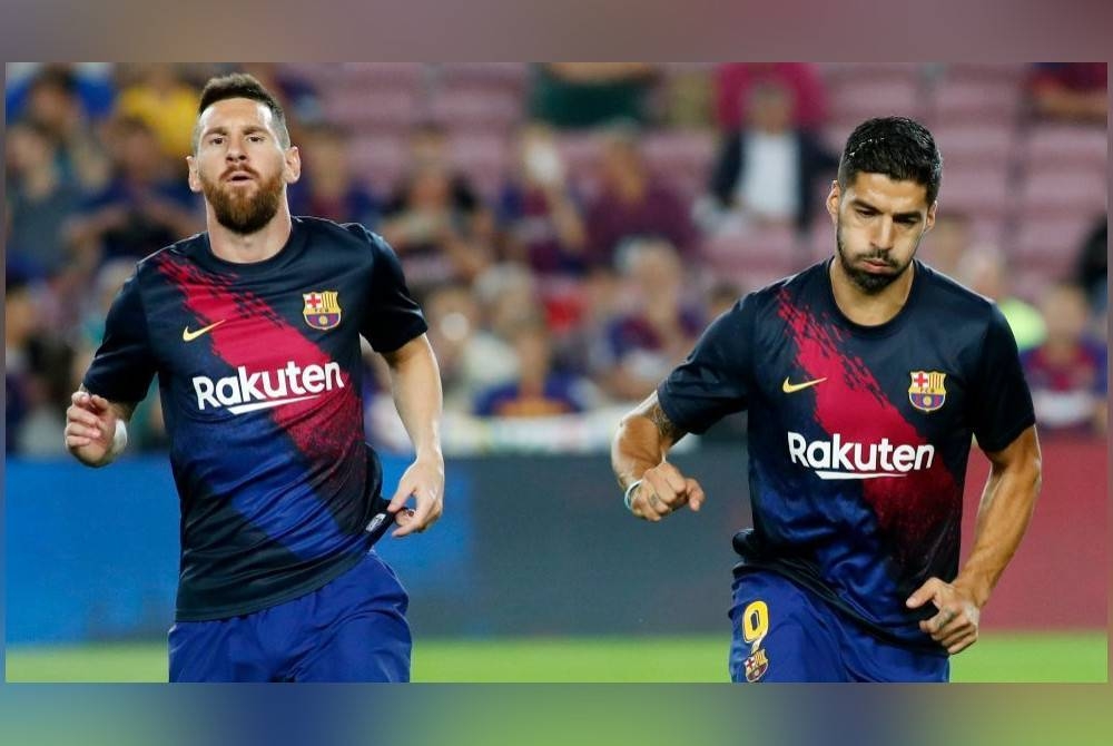 Messi, Suarez semasa di Barcelona.