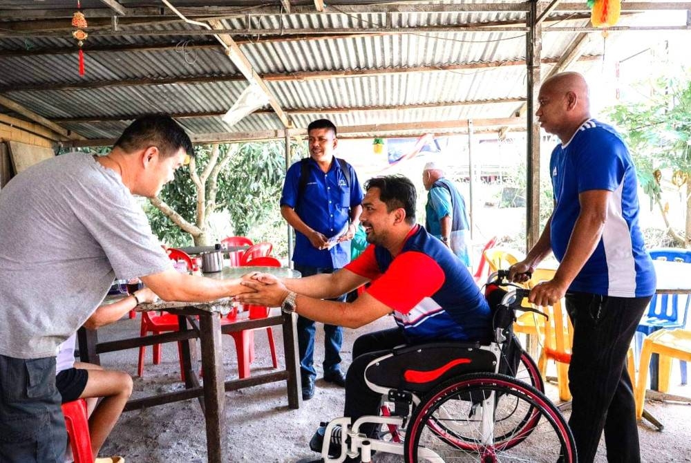 Mohd Zaidy kembali berkempen meskipun terpaksa berkerusi roda.