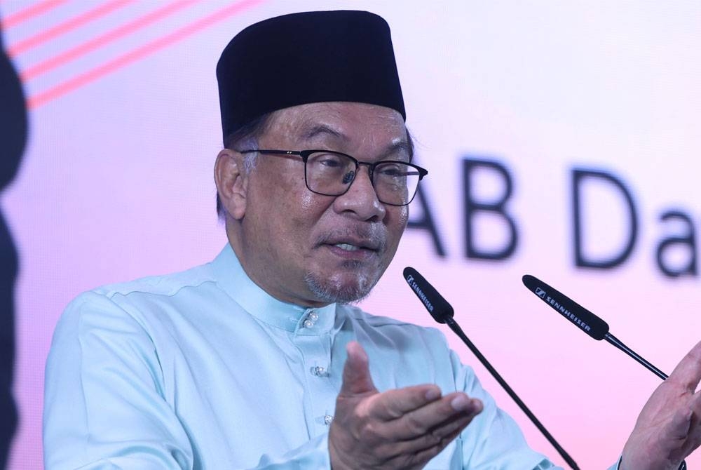 Anwar berucap pada Majlis Sidang Kemuncak Tahunan Pengkomersialan Malaysia 2023 di Connexion, Kuala Lumpur hari ini. - Foto Bernama