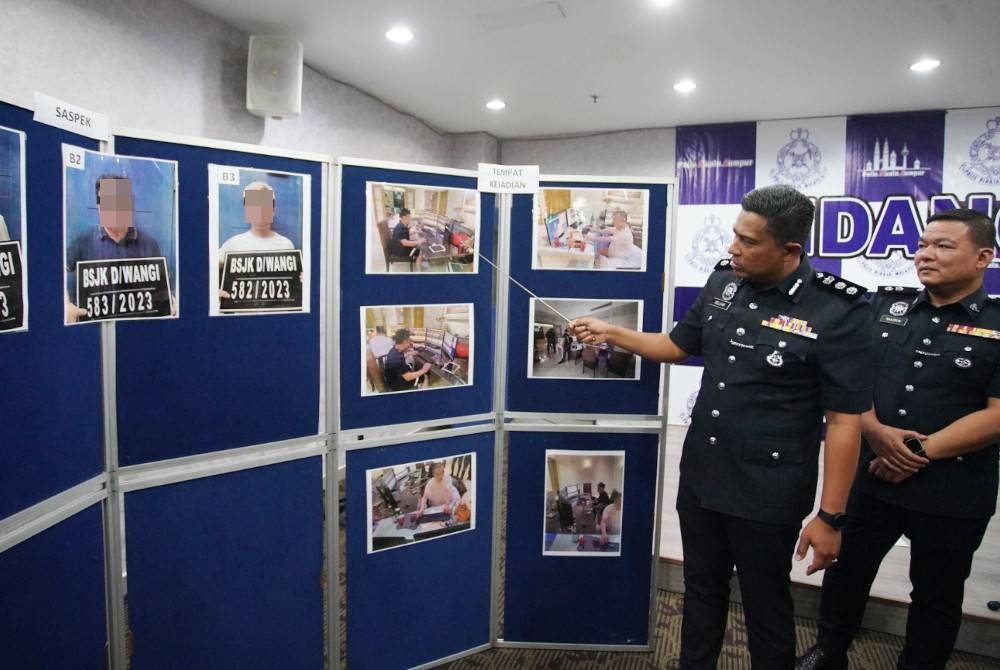 Noor Dellhan menunjukkan sebuah kondominium mewah dijadikan tempat perjudian dalam talian di Kia Peng, Kuala Lumpur.