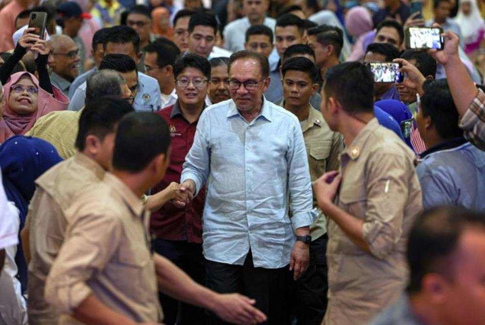 Anwar hadir pada Majlis Perjumpaan bersama Usahawan di Dewan Konvensyen Taman Tamadun Islam pada Rabu. - Foto Bernama