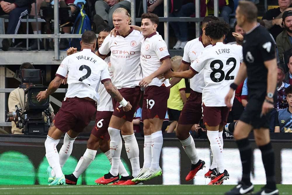 City tampil cemerlang menundukkan Burnley 3-0. - Foto AFP