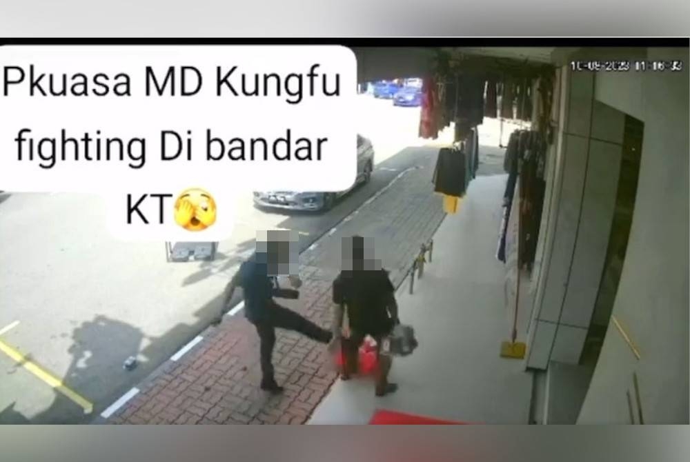 Tular rakaman video berdurasi 34 saat memaparkan lelaki dipercayai anggota penguat kuasa itu mengejar dan bertindak menendang seorang lelaki yang sedang berjalan kaki sambil membawa beberapa barangan. - Foto sumber Facebook