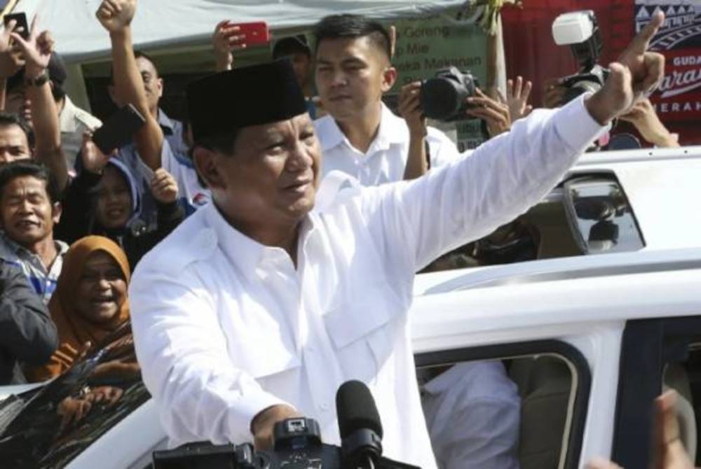 Empat parti politik secara rasmi mengisytiharkan sokongan mereka terhadap Prabowo Subianto sebagai calon dalam pilihan raya presiden Indonesia 2024. - Foto AP