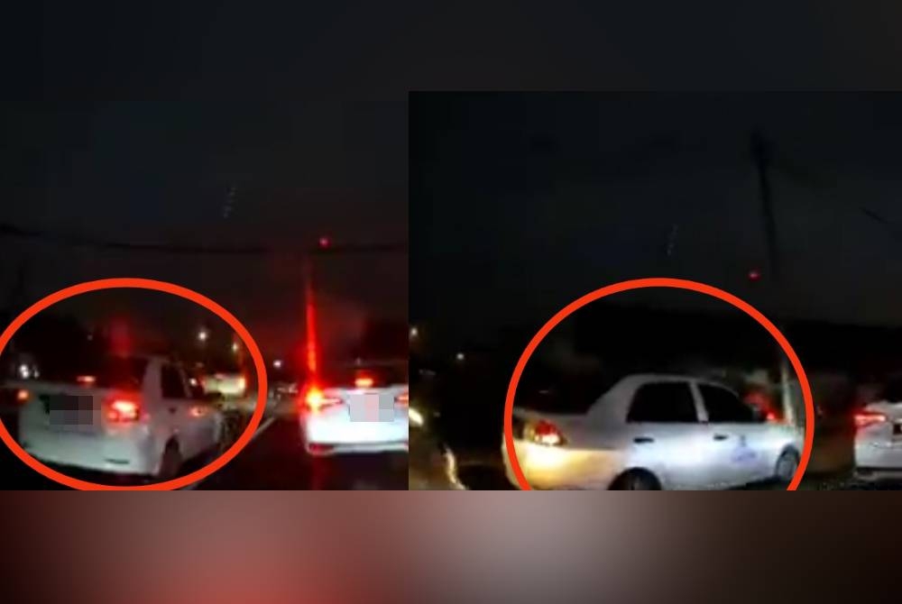 Tangkap layar rakaman video sebuah kereta yang dipandu seorang Polis Bantuan memotong barisan kenderaan lain di Jalan Penghulu Abu Bakar, Klang baru-baru ini.