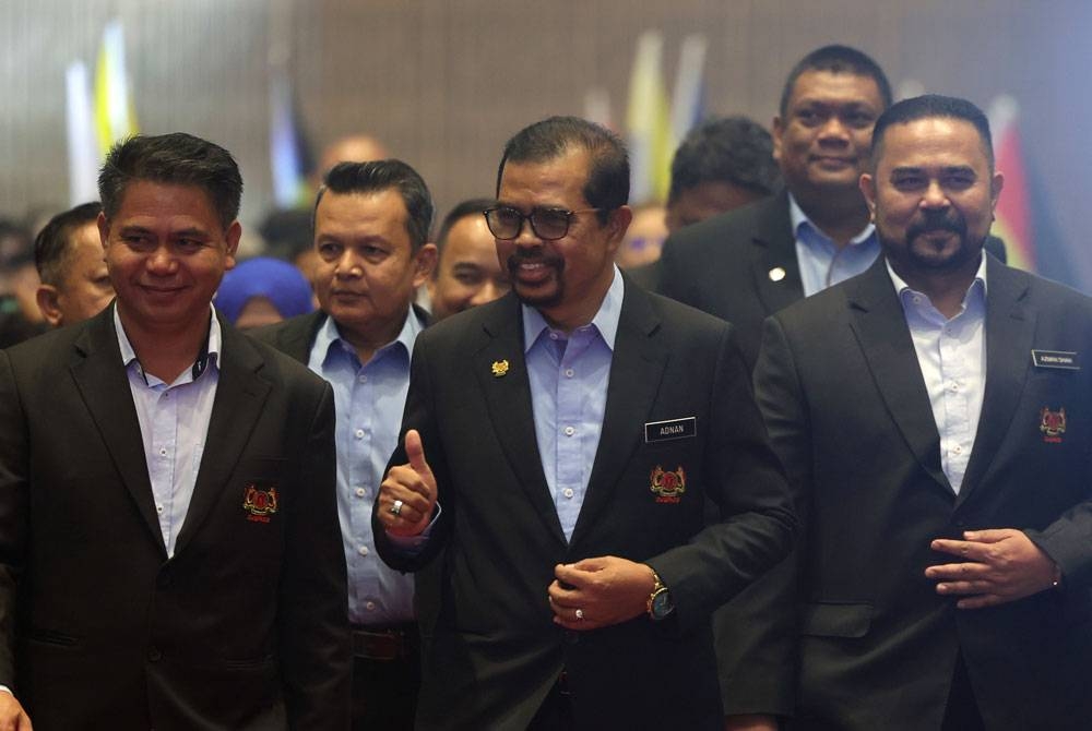 Adnan (tiga dari kiri) ketika hadir pada majlis perhimpunan penjawat awam sempena Program Merdeka Madani Ceupacs 2023 di Pusat Konvensyen Antarabangsa Sabah (SICC) pada Jumaat. - Foto Bernama