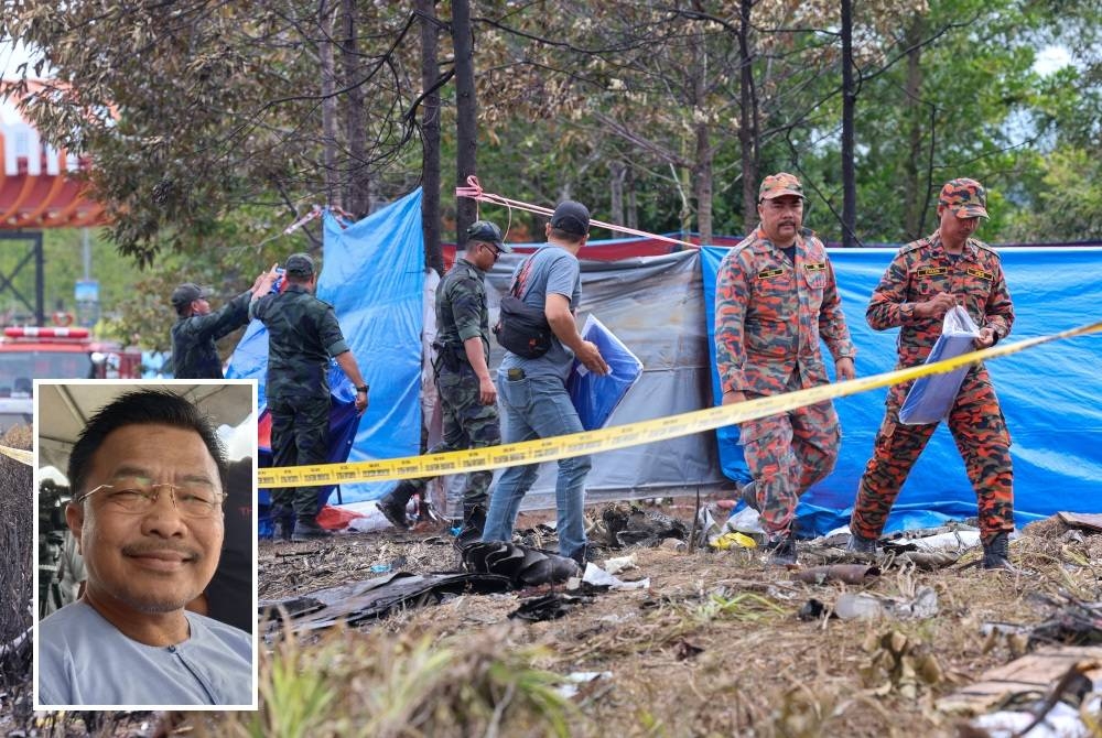 Anggota keselamatan menutup bangkai pesawat dengan kanvas di lokasi nahas Elmina. - Foto Bernama (Gambar kecil: Mohd Sharkar)