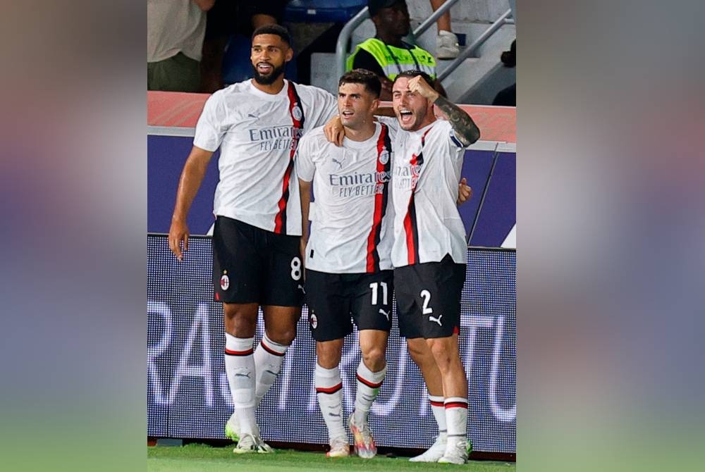 Pulisic (tengah) menjadi watak penting kemenangan Milan ke atas Bologna 2-0 dalam saingan Serie A di Stadium Renato Dall'Ara awal pagi Selasa. - Foto EPA