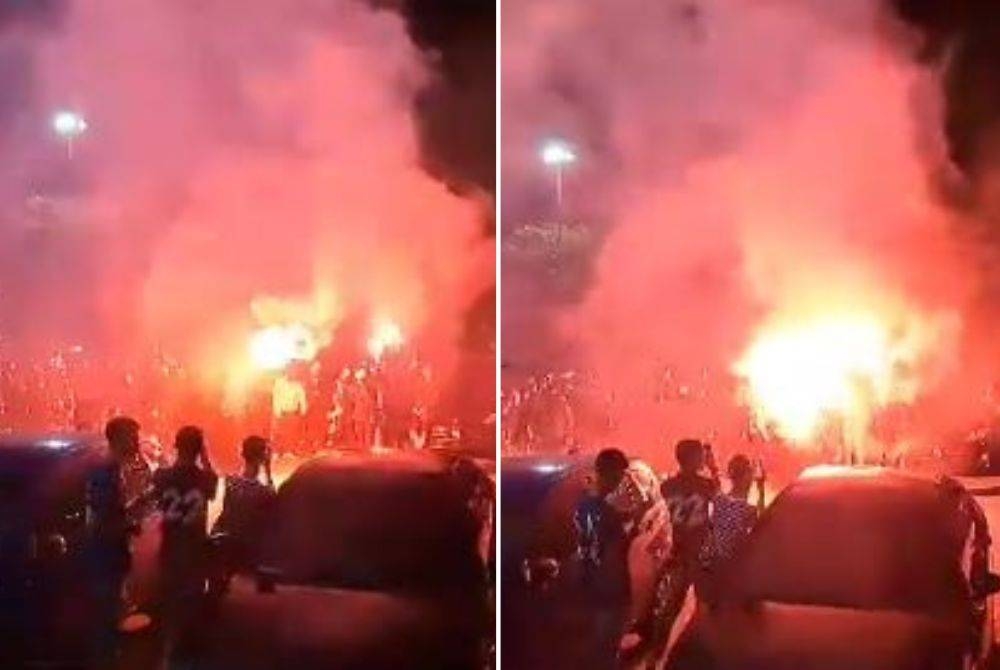 Tangkap layar video yang memaparkan penyokong Kelantan FC bertindak membakar suar sebaik sahaja keluar dari Stadium Sultan Muhammad Ke-IV, Kota Bharu, malam Sabtu.