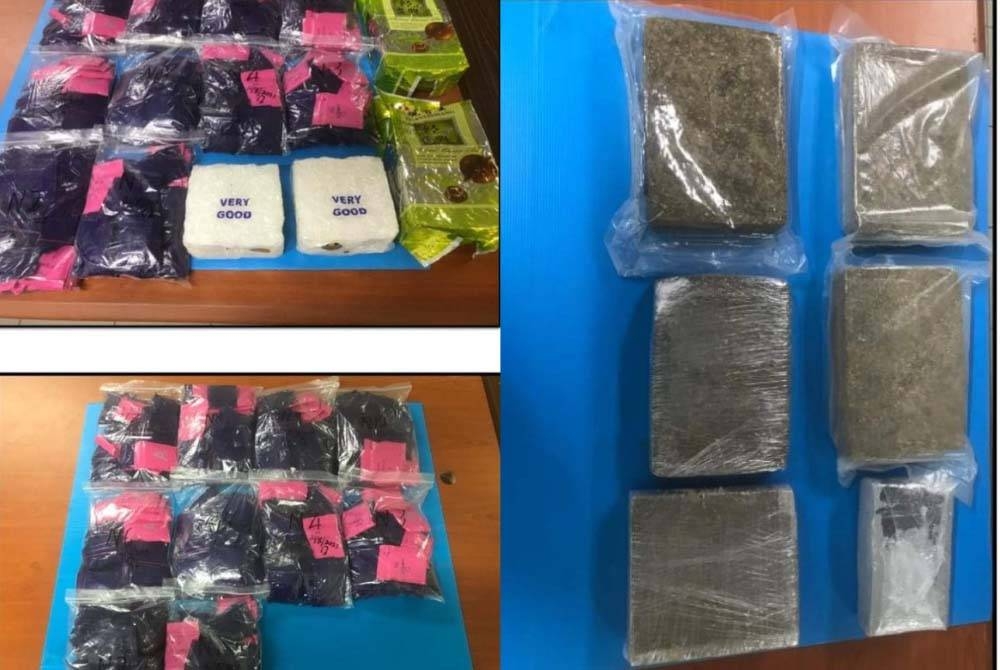 Pemeriksaan kedua berjaya menemukan lebih lapan kilogram dadah jenis pil WY dan methamphetamine bernilai lebih RM400,000. Polis merampas ganja yang ditemui dalam sebuah kereta dinaiki empat suspek. - Foto FB Polis Perak