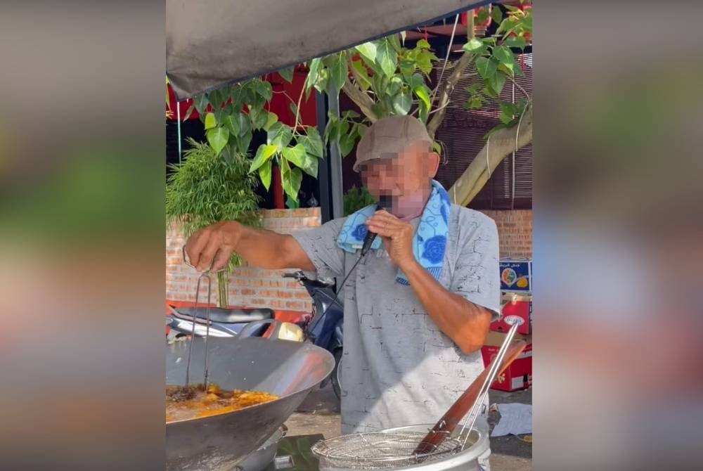 Mangsa dikenali penduduk kerana berniaga sambil menyanyi maut selepas menegur pelanggan yang menyentuh pisang goreng dengan tangan di Pokok Assam, Taiping. - Foto ihsan pembaca