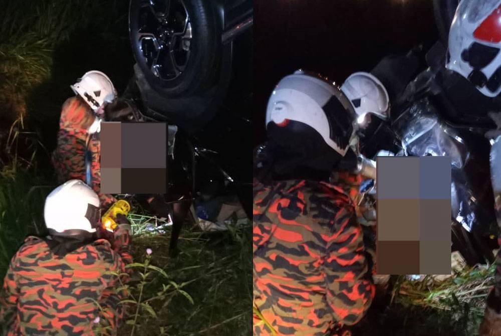 Anggota bomba membantu mangsa yang cedera dalam kemalangan di Tanjung Bin, Pontian pada malam Sabtu.