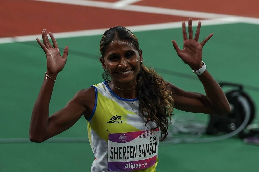 Shereen Samson melambaikan tangan selepas tamat acara 400 Meter akhir wanita pada Sukan Asia Hangzhou 2022 di Stadium Olimpik Hangzhou dengan meraih pingat gangsa dengan catatan masa 52.58 saat. - Foto: Bernama
--fotoBERNAMA (2023) HAK CIPTA TERPELIHARA